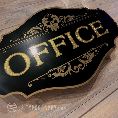 Gold leaf ornamental lettering