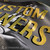 Luxury custom banner showcasing expert gilding and fine artistic detail.