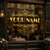 Elegant storefront featuring a custom gold Art Deco window decal inspired by 1920s design.