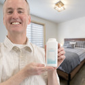 Male model holding Bentonite Powder.