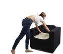 Waterproof Seat Cover being placed on armchair.