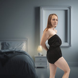 Waterproof Incontinence Romper on female model, side-view.