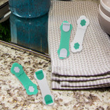 Pin-free turquoise diaper fasteners.