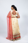 Adorned with vibrant floral and pearl embroidery, this lehenga set is a stunner. Paired with a blouse featuring see through net sleeves with embroidery, built in cups, and adjustable doris in the back. Comes with a peach net dupatta with pearl embroidery. Our skirts are stitched to fit sizes S-L through adjustable tie or elastic at the back. Please refer to the size guide.