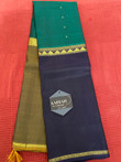 Look no further if you are trying to pick a traditional yet simple and elegant saree in alluring color combination. Pallu (the hanging end of a saree) needs a special mention but its beauty and elegance that makes this saree timeless. Comes with a stitched blouse.