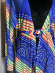 Meet our most fun and vibrant design- a multi-purpose Kimono, just in time for fall and all the festivities. A perfect layering piece whether at beach, brunch or get together. Our Kimonos are light weight, vibrant, and versatile. Featuring bell sleeves. Comes with a detachable belt. Length 50". Can be hemmed if needed.