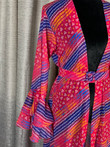 Meet our most fun and vibrant design- a multi-purpose Kimono, just in time for fall and all the festivities. A perfect layering piece whether at beach, brunch or get together. Our Kimonos are light weight, vibrant, and versatile. Featuring bell sleeves. Comes with a detachable belt. Length 50". Can be hemmed if needed.