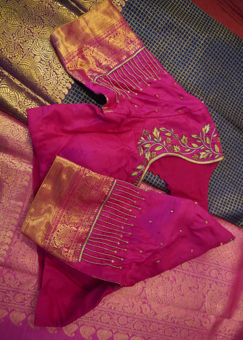 This intricately woven masterpiece with close zari checks exemplifies the sheen, regality and beauty of a Kanchipuram saree. You need to see this one to truly appreciate its beauty. Comes with a tastefully designed embroidered blouse.