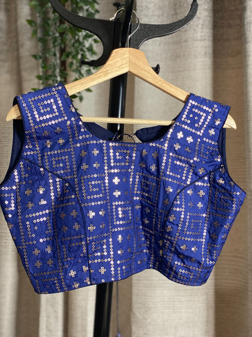 Designer Blouse. Comes with attachable sleeves. Designer Blouse. Comes with attachable sleeves.