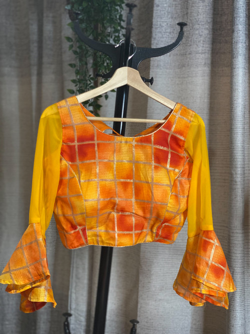 Designer Blouse featuring bell sleeves. Designer Blouse featuring bell sleeves.