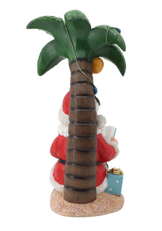 Thumbnail 2: Magical Season 14" Resin Santa Reading Under Palm Tree 