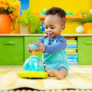 Thumbnail 7: Bright Stars Press & Glow Spinner Musical Toy 