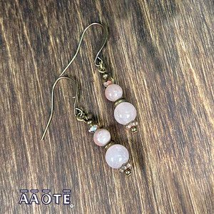 Designed and assembled here at AAOTE these gemstone earrings are lightweight, easy to wear, and feature gem, glass, and metal beading.