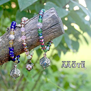 These beautiful beaded stretch bracelets are colorful, sparkly, and come with a decorative cage diffuser. They are comprised of glass and metal beads, and are finished with a metal cage that holds a felt insert. Simply apply a few drops of essential oil onto the felt insert from outside the cage and enjoy the aromatherapy all day long.