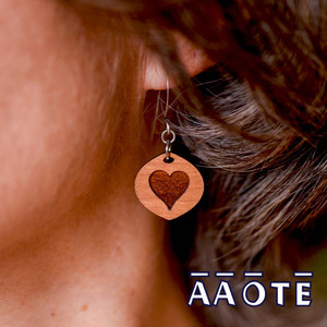 These earrings are lightweight, simply natural beauty. They’re also functional by applying a few drops of essential oil to the engraved wood focal to enjoy aromatherapy all day long.

The wood focals are made in our shop in Pennsylvania, USA, and are sourced from sustainably grown American hardwood. The engraved image derives from AAOTE's Tari Zarka's artwork. Variations in the wood's grain and color are natural distinctions making each piece unique.
