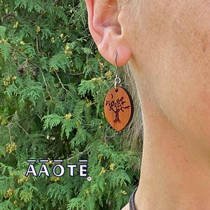These earrings are lightweight, simply natural beauty. They’re also functional by applying a few drops of essential oil to the engraved wood focal to enjoy aromatherapy all day long.
The wood focals are made in our shop in Pennsylvania, USA, and are sourced from sustainably grown American hardwood. The engraved image derives from AAOTE's Tari Zarka's artwork. Variations in the wood's grain and color are natural distinctions making each piece unique. These earrings are lightweight, simply natural beauty. They’re also functional by applying a few drops of essential oil to the engraved wood focal to enjoy aromatherapy all day long.
The wood focals are made in our shop in Pennsylvania, USA, and are sourced from sustainably grown American hardwood. The engraved image derives from AAOTE's Tari Zarka's artwork. Variations in the wood's grain and color are natural distinctions making each piece unique.
