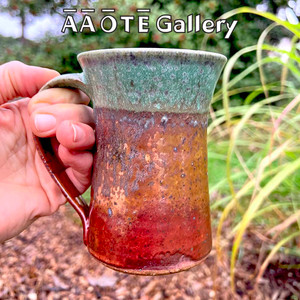 Exquisitely hand-crafted in the USA, these thrown pottery mugs make a great gift idea! They are thicker pottery with a nice weight to them. We often think of them as kind of a beer stein style mug. Exquisitely hand-crafted in the USA, these thrown pottery mugs make a great gift idea! They are thicker pottery with a nice weight to them. We often think of them as kind of a beer stein style mug.
