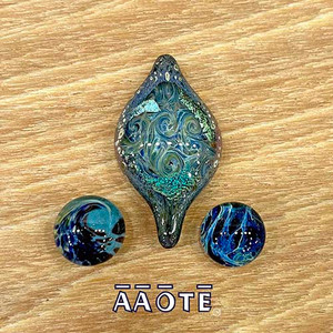 Cabachons are intended for jewelry designers who will work the unique, TZ Glass art cabachon into their own design either by wire wrapping or bezel setting the cabachon.
These have no bail. The piece you see in this section is the piece you will receive. Cabachons are intended for jewelry designers who will work the unique, TZ Glass art cabachon into their own design either by wire wrapping or bezel setting the cabachon.
These have no bail. The piece you see in this section is the piece you will receive.