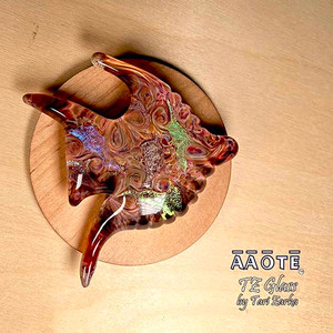 Flameworked glass art paperweight by AAOTE's founder, Tari Zarka. Totally one-of-a-kind, investment-quality glass art on a wooden trivet.
This abstract fish design features dichroic glass and a whirling skies design. It's approximately 3"W x 2.75"W x .75"H on a 1/8" tall trivet.
There is only one of each available. The piece you see is the piece you get. It is signed with a TZ etched into the bottom of the piece. Flameworked glass art paperweight by AAOTE's founder, Tari Zarka. Totally one-of-a-kind, investment-quality glass art on a wooden trivet.
This abstract fish design features dichroic glass and a whirling skies design. It's approximately 3"W x 2.75"W x .75"H on a 1/8" tall trivet.
There is only one of each available. The piece you see is the piece you get. It is signed with a TZ etched into the bottom of the piece.