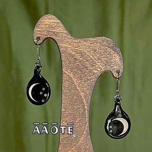 We can't always get out to see a perfect moonscape but with these exquisitely handmade glass art interpretations we can keep close stellar moon vibes wherever we roam.
Available in four options:
Waxing Crescent Moon with Stars and Full Moon pair (waxing moon it's a backwards 'c').
Waning Crescent Moon with Stars and Full Moon (waning moon it's a 'C' facing correctly).
Waxing and a Waning Crescent Moon pair.
Both Full Moon pair.
These are made to coordinate with our Full Moon Crescent Moon double sided pendant and the new smaller Moon Pendant Necklace. We can't always get out to see a perfect moonscape but with these exquisitely handmade glass art interpretations we can keep close stellar moon vibes wherever we roam.
Available in four options:
Waxing Crescent Moon with Stars and Full Moon pair (waxing moon it's a backwards 'c').
Waning Crescent Moon with Stars and Full Moon (waning moon it's a 'C' facing correctly).
Waxing and a Waning Crescent Moon pair.
Both Full Moon pair.
These are made to coordinate with our Full Moon Crescent Moon double sided pendant and the new smaller Moon Pendant Necklace.