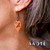 These earrings are lightweight, simply natural beauty. They’re also functional by applying a few drops of essential oil to the engraved wood focal to enjoy aromatherapy all day long.

The wood focals are made in our shop in Pennsylvania, USA, and are sourced from sustainably grown American hardwood. The engraved image derives from AAOTE's Tari Zarka's artwork. Variations in the wood's grain and color are natural distinctions making each piece unique.
