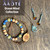 Our Ocean Mind Collection features a palette that allows our mind to find the calm vibes being by the sea can bring.
Comprised of our Lava Diffuser Beaded Stretch Aromatherapy Bracelet in Coastal Hues, Wood Diffuser Bracelet on Cotton in Sun, TZ Glass Tiny Fidget Widget Mindfulness Tool Necklace in Ocean Mist, TZ Glass Sunburst Glass Drop Earrings in Ocean Mist/Sunshine, TZ Glass Shell Necklace in Ocean Mist on 20" chain, and Lava Diffuser Aromatherapy Earrings in Deep Sea AB. Choose just one or go for a few. They look great together! Our Ocean Mind Collection features a palette that allows our mind to find the calm vibes being by the sea can bring.
Comprised of our Lava Diffuser Beaded Stretch Aromatherapy Bracelet in Coastal Hues, Wood Diffuser Bracelet on Cotton in Sun, TZ Glass Tiny Fidget Widget Mindfulness Tool Necklace in Ocean Mist, TZ Glass Sunburst Glass Drop Earrings in Ocean Mist/Sunshine, TZ Glass Shell Necklace in Ocean Mist on 20" chain, and Lava Diffuser Aromatherapy Earrings in Deep Sea AB. Choose just one or go for a few. They look great together!