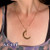 Fun and easy-to-wear necklaces with charms and glass crystals finished on a 20" plated brass chain. 

The Moon Pendant is approximately 1.75" tall.