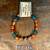 Our men's beaded stretch bracelets are made for a larger wrist with a combination of wood, glass, and gemstone beads. They do look awesome on the ladies, too, but this current listing is for the larger size.

These men's bracelets finish at approximately 8 inches, (our women’s medium bracelet is about 7.25-7.5 inches). Please note that bead styles and color may vary slightly, and natural materials may vary in texture and shape.

They are designed by Tari Zarka and assembled by team AAOTE in Bucks County, Pennsylvania, USA.