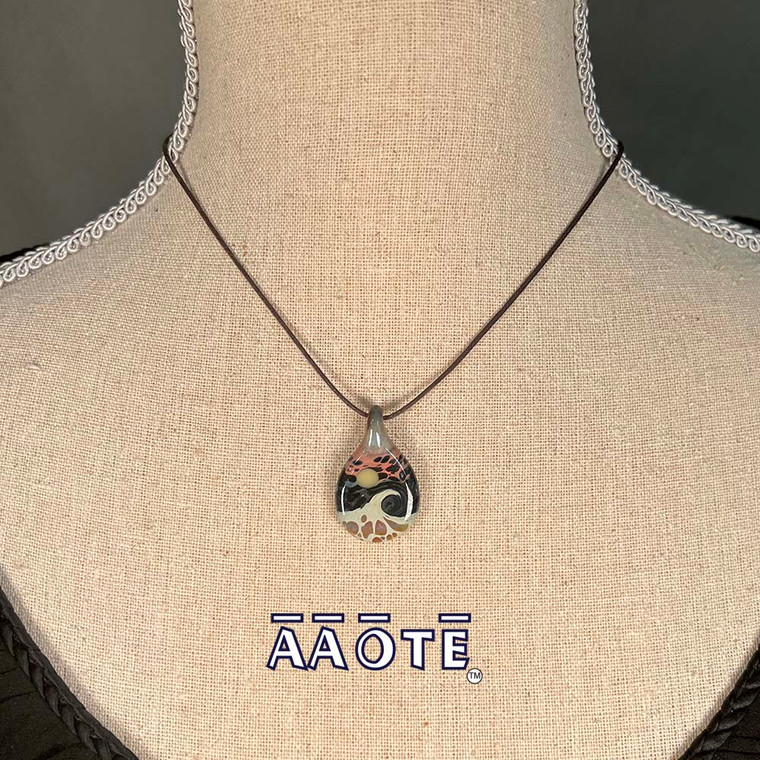 Created by Tari Zarka, maker of TZ Glass, these wearable, minature works of glass art are meant to be year-round reminders of Healing Water Vibes for those that love the beach.