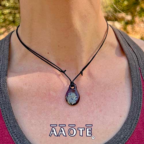 Tiny Fidget Widgets are individually handcrafted glass artistry. Created with good vibes by Tari Zarka to be smooth, slightly concaved, and calming to the touch. It's a gorgeous sensory satisfaction necklace that can helps us ground. Ease your mind by repeating a motion, like you would on a worry stone.