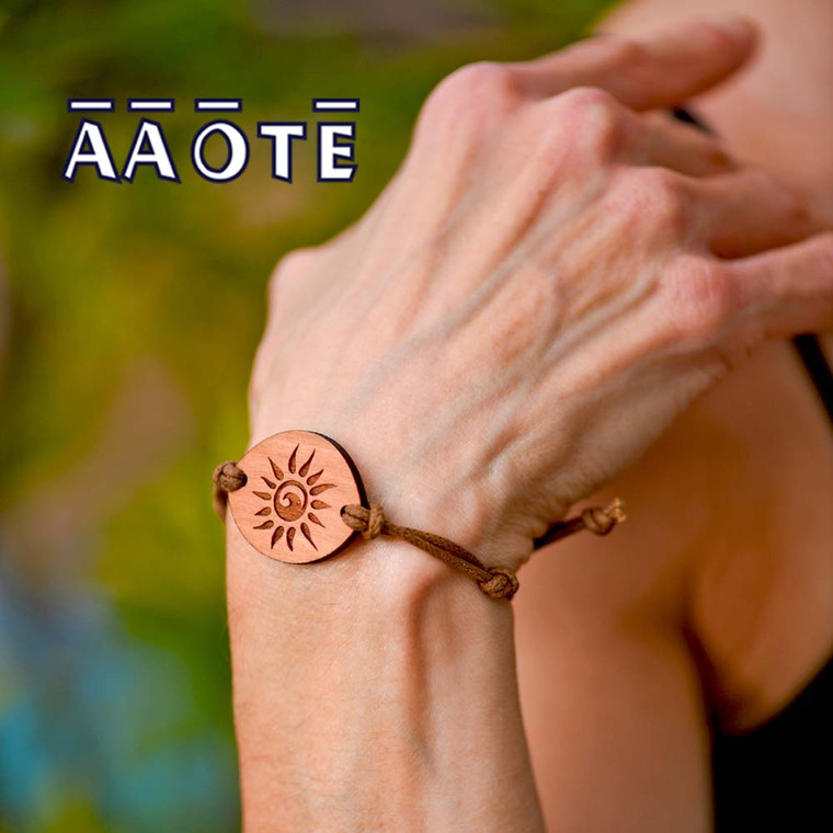 Aromatherapy diffuser bracelets  in our Tree of Life design, on a comfy, adjustable cotton cord. A functional, minimalistic adornment for the guys (or gals, or children ages 6+). Made from sustainably USA-grown lumber, fabricated in Pennsylvania by AAOTE, these under twenty dollar handmade gifts that give back vibe as beautifully as they are functional.