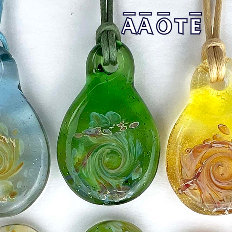 AAOTE’s founder, Tari Zarka, maker of TZ Glass, creates the Chakra Rainbow Fidget Widgets to be a tool for mindfulness. They are truly a necklace both women and men can enjoy. 

Each is made with a very slight concave on a soothingly smooth surface. Ease your mind by repeating a motion, like you would on a worry stone.