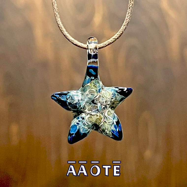 Wearable TZ Glass Art Sea Star necklaces are a handmade gift idea created in Bucks County, Pennsylvania to help us keep close a reminder of our higher-vibing, seaside times wherever we may roam.

Each and every one created will have it's own truly unique look due to how they are literally hand-sculpted in the flame, one-by-one.