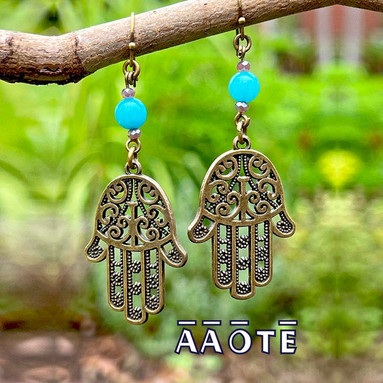 Fun and generally lightweight given their larger size (Hamsa design is the heaviest and largest of the offerings). To give you a better idea of earring size, the beaded center portion is approx .75” long plus the length of the charm and earwire. These are LONG earrings.