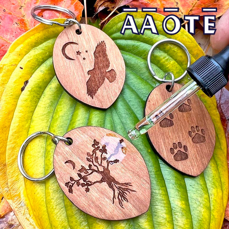 Engraved at AAOTE on sustainably grown, USA-sourced hardwoods. Created to bring more ways to enjoy aromatherapy in our day-to-day. These are lovely little, functional gift ideas for men and women. They are a nice introduction to our extensive Wood Diffuser Collection. 

These are 1/8" thick hardwood on a keychain ring. The wood piece itself is 2" tall x 1.5" wide.