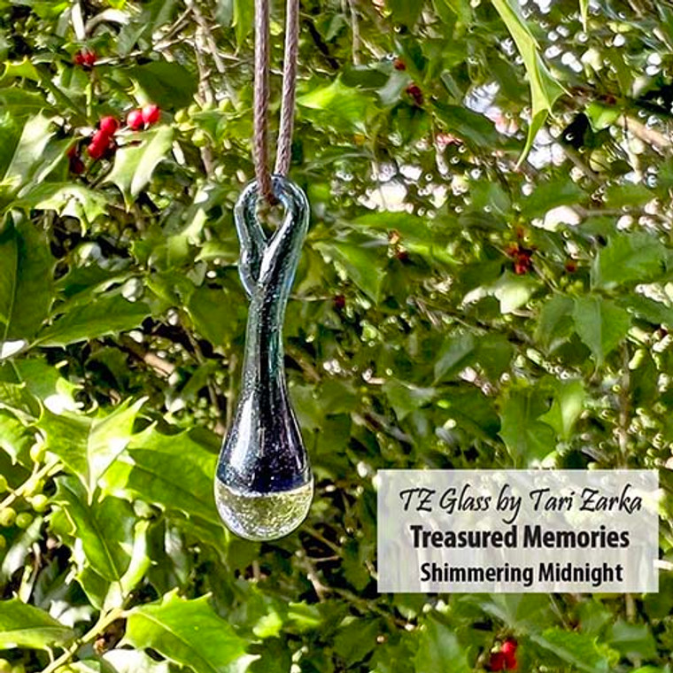 Drop of Positivity is now available as a memorial glass option in our Treasured Memories Collection. In this design the ashes are encased at the base of the drop under a clear lens.