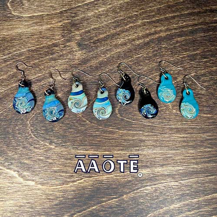 Tiny Fidget Widgets are individually handcrafted glass artistry. Created with good vibes by Tari Zarka to be smooth, slightly concaved, and calming to the touch. These are gorgeous sensory satisfaction earrings that can help us ground. Ease your mind by repeating a motion, like you would on a worry stone.