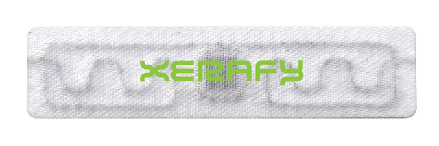 Various types of RFID laundry tags including heat-sealed, sewn-in, button, and silicone tags