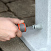 At the base of the Watering Post is a connection for a 1/2" hose-clip connnector.