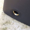 One of three brass threaded ports (bung removed) for connecting taps or linking to other water tanks.