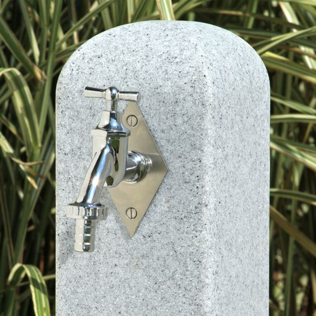 Detail of the tap and Light Granite stone effect finish.