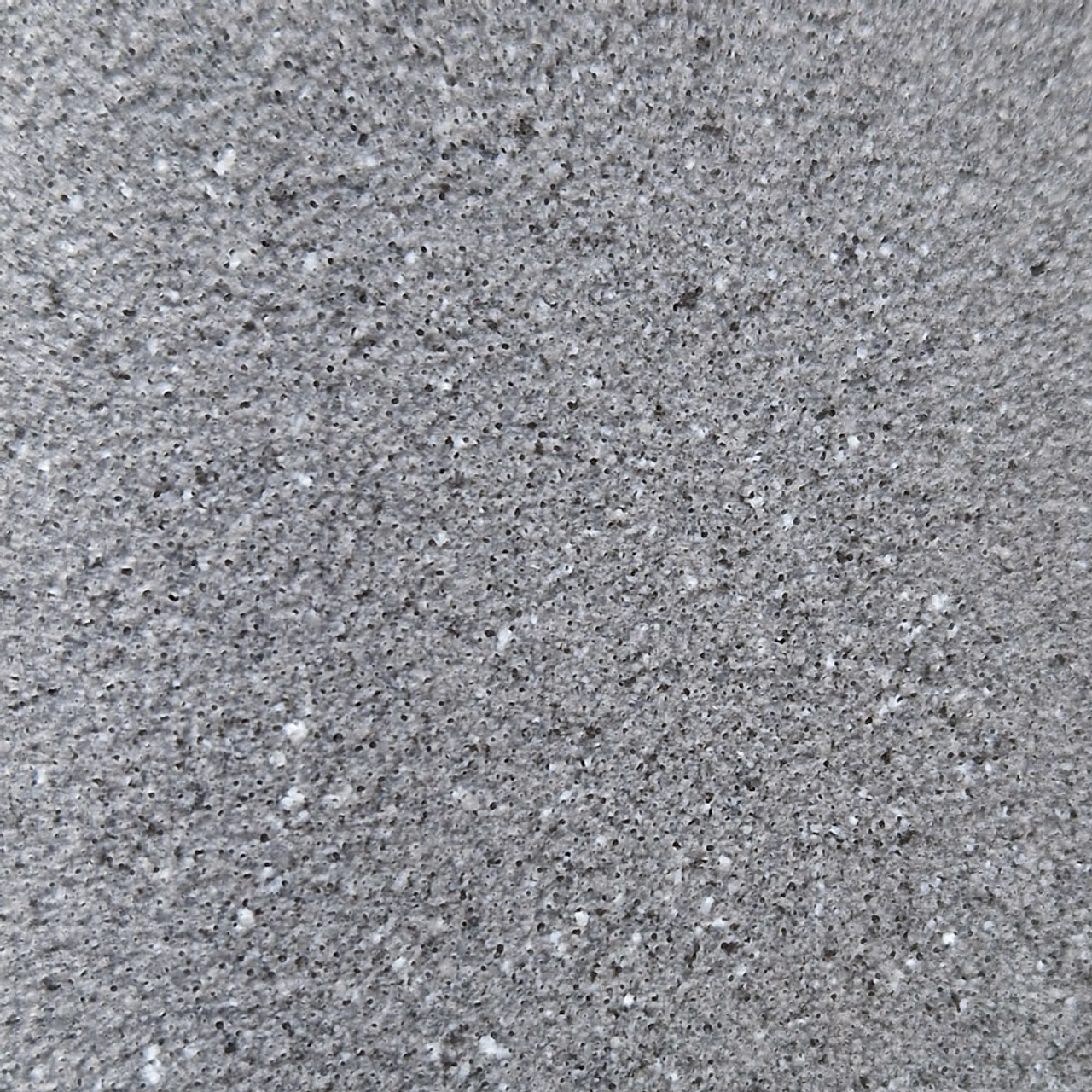 Close up showing the colour and texture of the Blue Grey Granite version of the 800L Wall tank.