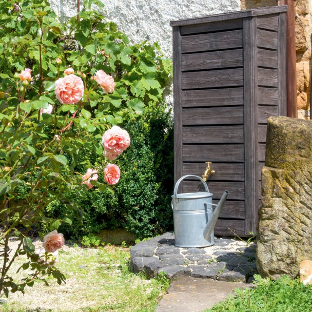 230L Wooden Effect Water butt in garden