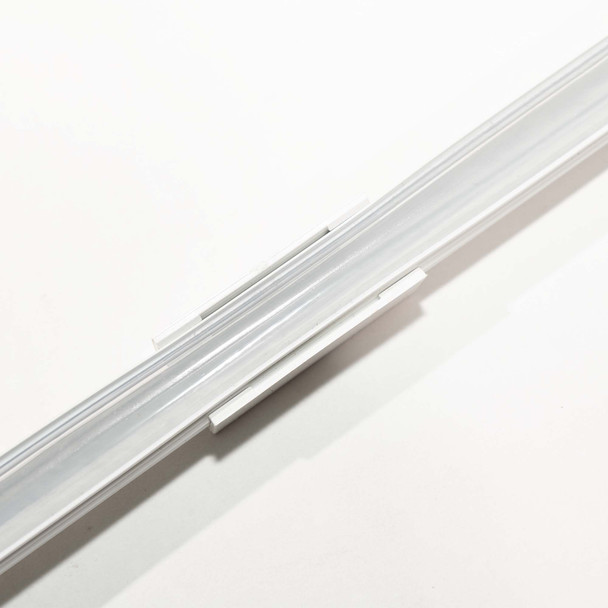 Clear Hose in Bracket is fixed vertically to a vertical surface. Clear Hose in Bracket is fixed vertically to a vertical surface.