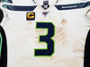 Russell Wilson Framed Game Used Seattle Seahawks White Nike Jersey With Captain's Patch & NFL 100 Logo Unsigned SKU #203517