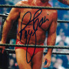 Ric Flair Autographed 11x14 Photo vs. Undertaker JSA Stock #203606