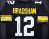 Pittsburgh Steelers Terry Bradshaw Autographed Framed Black Jersey Beckett BAS Stock #206949 Pittsburgh Steelers Terry Bradshaw Autographed Framed Black Jersey Beckett BAS Stock #206949