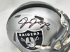Josh Jacobs Autographed Las Vegas Raiders Silver Speed Mini Helmet Beckett BAS QR #WR38830