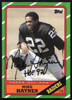 Mike Haynes Autographed 1986 Topps Card #73 Los Angeles Raiders SKU #259264