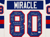 1980 Team USA Miracle on Ice Autographed Framed White Jersey "Do You Believe In Miracles?!" With 18 Signatures Including Eruzione & Craig Beckett BAS Witness Stock #262550